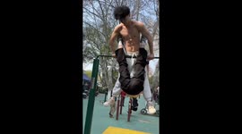 Twin brothers astonish with jaw-dropping 'human wheel' gymnastics in China