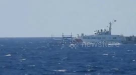 China Coast Guard 'threaten Philippine boat with water cannon'