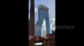 UK: Storm Kathleen – Building Materials Blown From Construction Site In Manchester