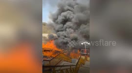 Officials douse massive fire that breaks out in shop near temple in northern India