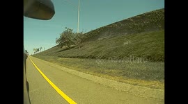 Stray Tire Causes Mayhem Off Highway