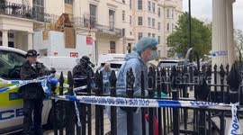Forensics officers enter 6 Stanhope Place after the body of a woman was discovered stabbed to death