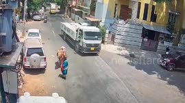 A Bull knocks motorcycle rider into path of lorry but he survives
