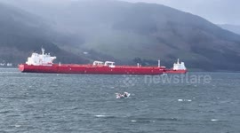 Oil Tankers Nordic Breeze and Sten Neptun passing each other on a stormy Loch Long in Argyll Scotland