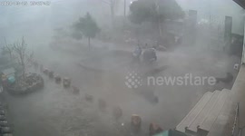 Powerful hailstorm captured on CCTV battering homes in China