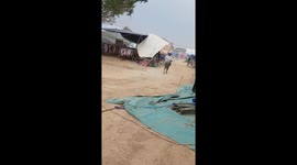 Storm batters market stalls amid weather warnings in Thailand