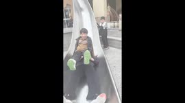 Chinese woman catapulted into air lands on man after slide collision