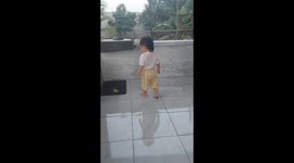 Child's attempt to catch duckling ends in surprise sit-down