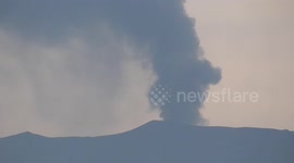 Smoke billows from Mount Marapi as Muslims in Indonesia celebrate Eid