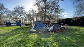 A Basic Sleeping Encampment On A Grass Field In Upmarket London's Park Lane