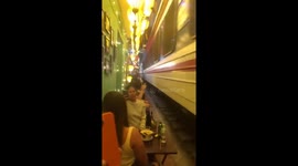 Tourists dine inches from speeding trains in Vietnam