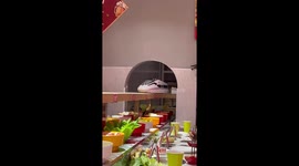 Toy train transport food to restaurant customers