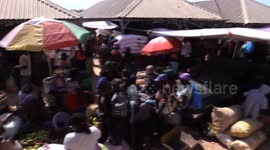 Haitian vendors earn bread at market close to border
