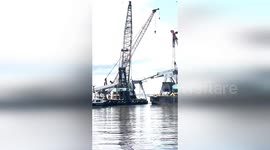 Salvage crews clear debris from collapsed Baltimore bridge