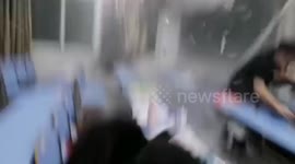 Severe storm shatters window frames in university classroom in China