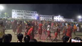 Devotees fling themselves onto bed of hot coal embers covered in thorny branches in east India