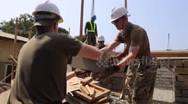 US and Philippine troops build classrooms as part of humanitarian operation