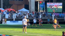 Players plunge into water during aqua rugby festival played on FLOATING pitch