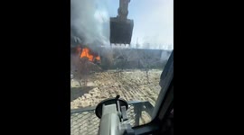 Quick-thinking excavator driver saves house and livestock from fire in northwestern China