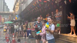 Tourists join Songkran water fight festival in Bangkok, Thailand