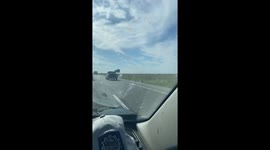 Dog Jumps From Truck Bed To Roof On Interstate