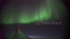 Jawdropping Northern Lights seen from plane flying from Denver to Iceland while over Canada
