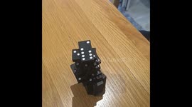 Dominoes building in the making, gets ruined before finishing,  not happy at.all