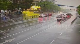 One dead as speeding car runs red light and smashes into opposing lane in China