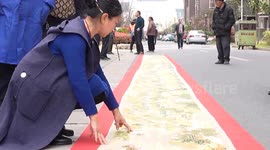 Talented woman crafts 24-metre embroidery of iconic Chinese scroll over a decade