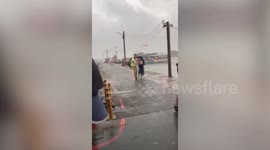 Storm batters passengers at dock in Taiwan