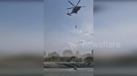 Bologna Firefighters Rescue Two Men from Treacherous Reno River Rapids in Italy
