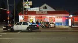 An LAPD Southwest gang unit struck a pedestrian and crashed into a burger stand in CA, USA