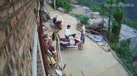 Bungling scooter driver saved by friend from riding off cliff