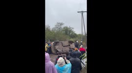Spectators help overturn flipped rally car to driver can finish race in Argentina