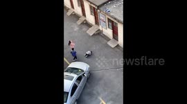 Children's prayers answered as gust of wind retrieves toy airplane from rooftop in China