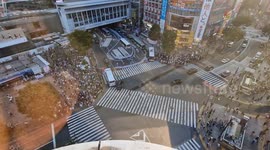 Cool aerial view hyperlapse of people over the Shibuya Crossing junction in Tokyo, Japan
