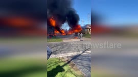 State Troopers Brave Inferno to Rescue Dog from Burning Home in Lockport, USA