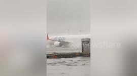 Planes battle through floods at Dubai airport amid heavy rain