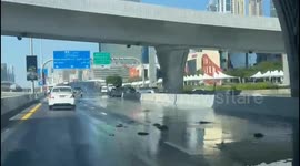 Stranded cars on Dubai highways, people fled their cars as waters were rising.