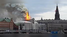 Fire engulfs historic dragon spire in Copenhagen, Denmark