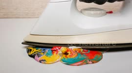 Oddly mesmerising footage as hot iron melts ice cube, ignites matches and creates wax art