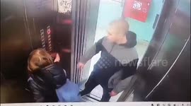 Thug snatches phone from 9-year-old girl in elevator in Russia