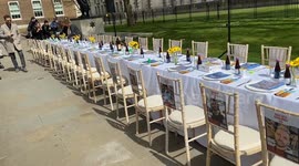 Pro-Israel campaigners set up a huge empty table outside Downing St calling for the release of Israeli hostages held by Hamas in Gaza