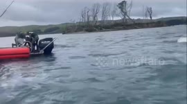 California officials rescue boaters after their vessel capsized