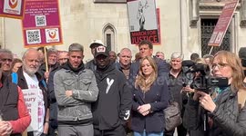 Former professional footballers join investment fraud victims in protest outside high court in London