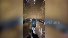 Video show Dubai resident riding electric scooter through flooded street