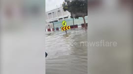 Video shows Tesla driving through flooded street in Dubai