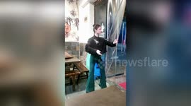 Chinese woman's impressive robotic performance for restaurant customers