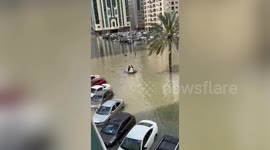 UAE residents use dinghy to paddle through flooded streets