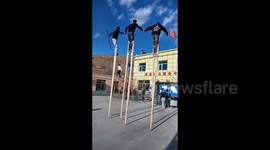 China: Practicing traditional stilt walking skill in Shandong